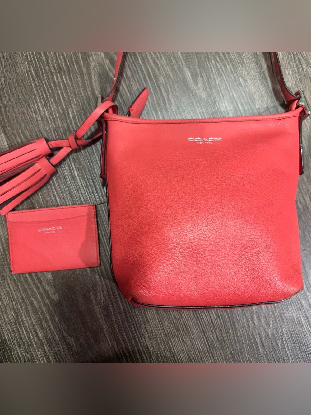 Coach Legacy Mini Duffle Crossbody
Coral-pink with cardholder